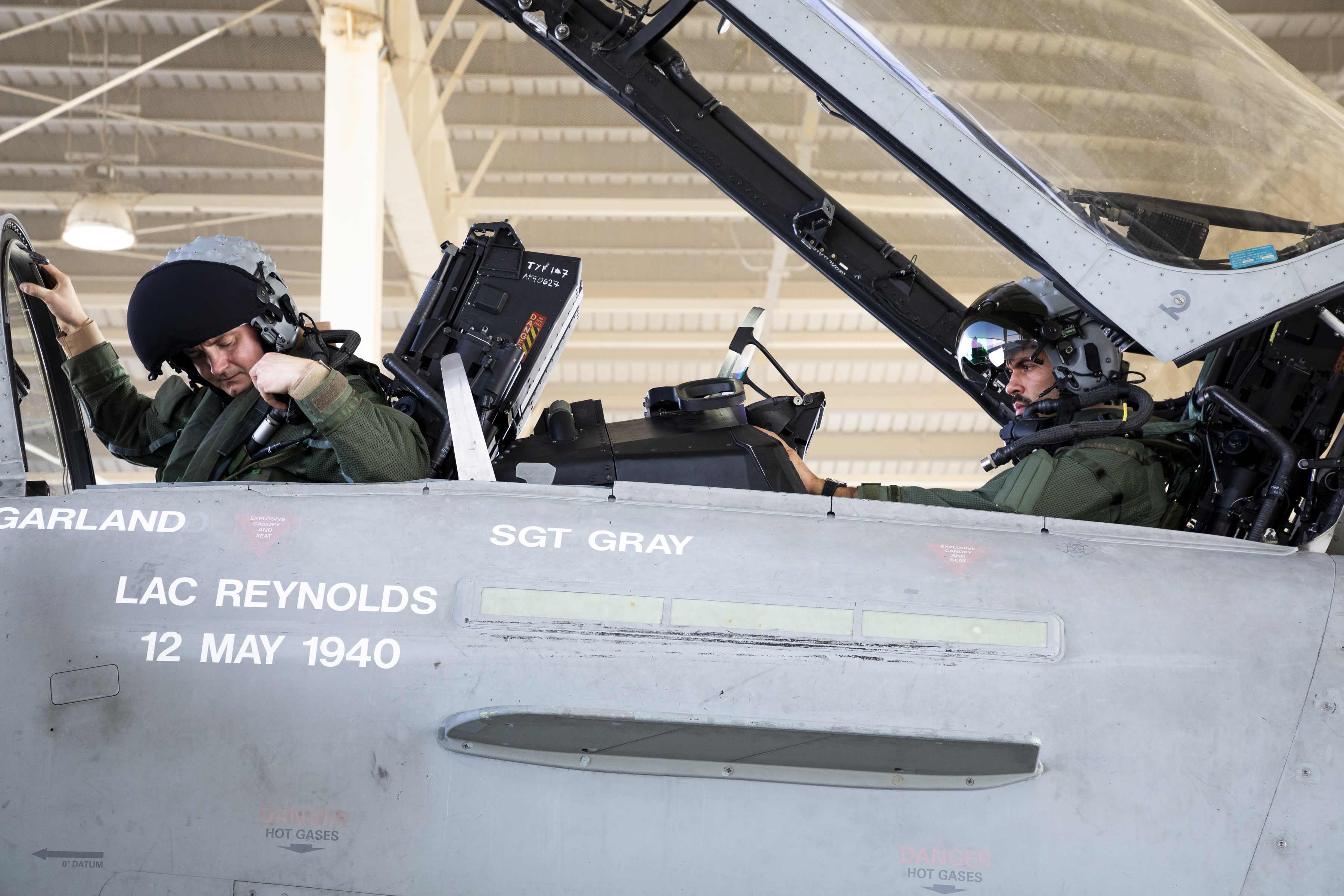 Image shows RAF Pilots in the cockpit of a Typhoon.